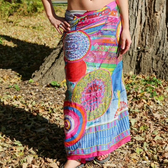 Multi colored sarong, shown as a skirt and tied in back.