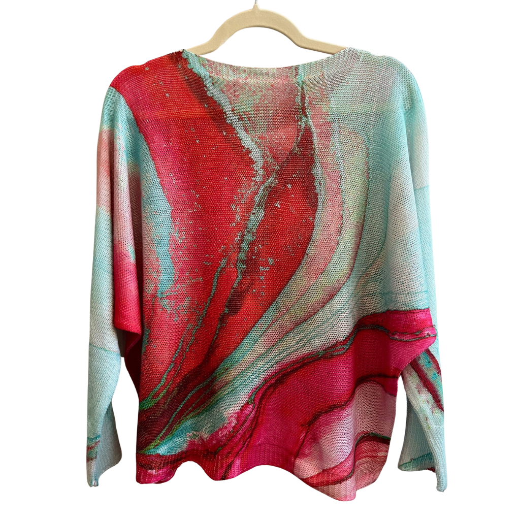 Tie Dye Fuchsia and Aqua Round Neck, Loose Knit Ladies Sweater on Hanger . Back View