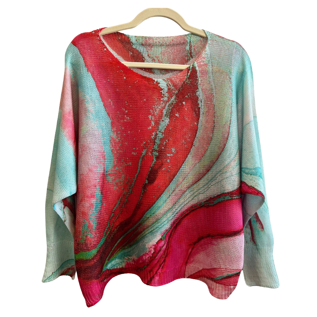 Tie Dye Fuchsia and Aqua Round Neck, Loose Knit Ladies Sweater on Hanger. Front View