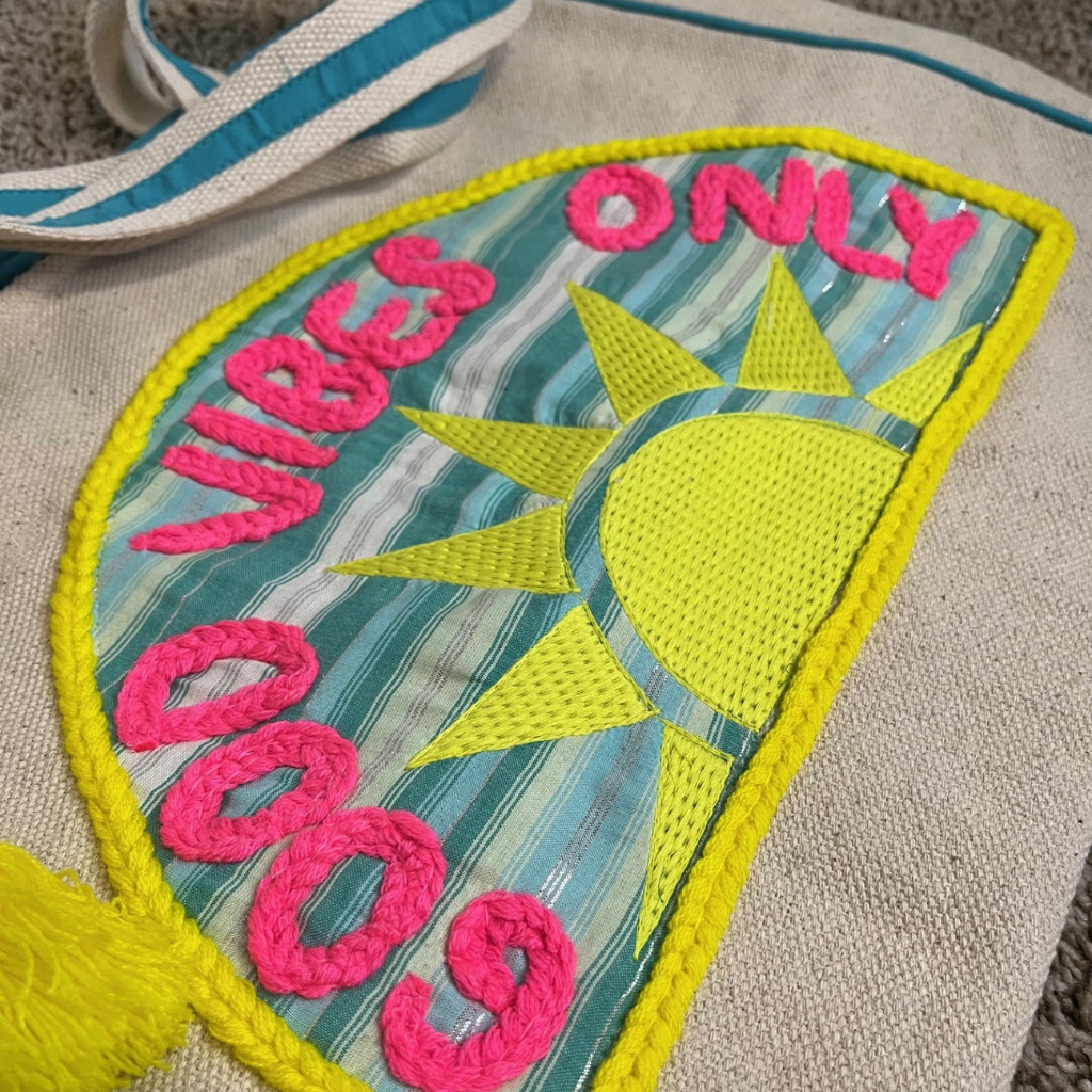 "Good Vibes Only" - Sunshine Patch Beach Tote Bag. Close Up of Yarn Embroidery.