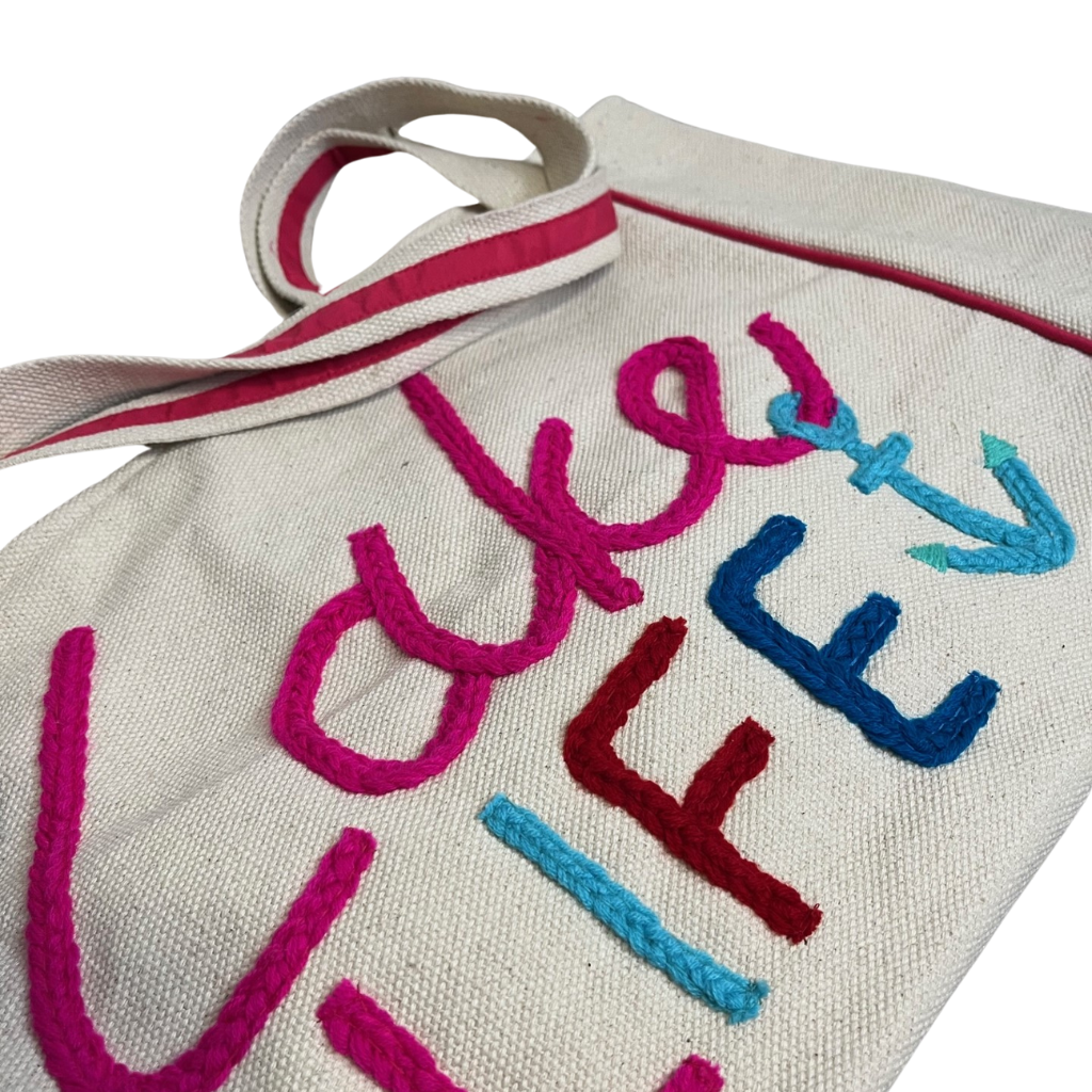 "Lake Life" - Yarn Embroidered, Beach Tote Bag with Tassels. Close Up of Yarn Embroidery.