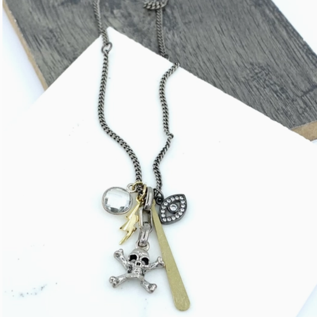 Rebel Multi Charm Edgy Necklace Close Up  Laying Flat